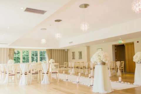 A gold and white wedding reception