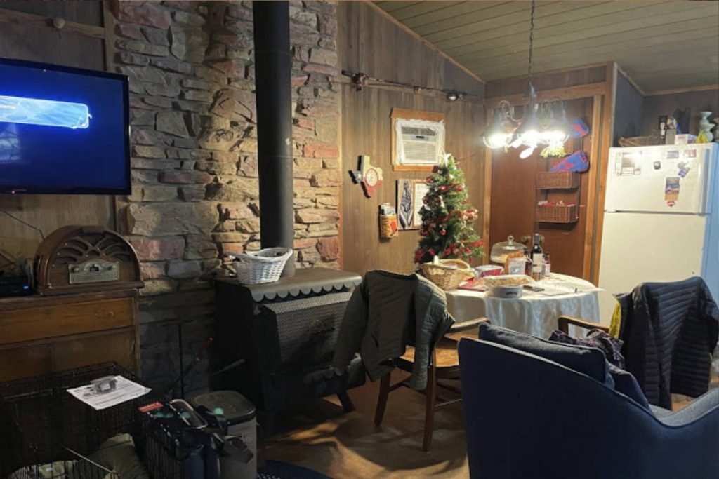 The kitchen and dining area in a room at The Venues and Bnbs of Monarc Ranch, a Texas hill country wedding venue