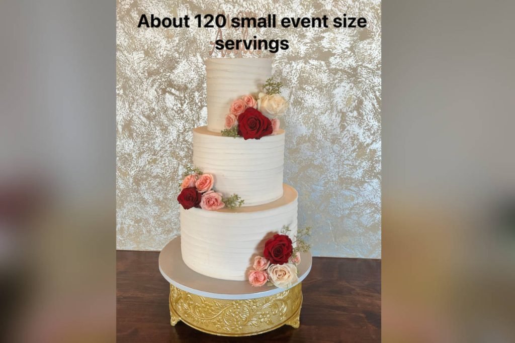 A 3-tier wedding cake with fresh flowers created by ROC Cakes and Cupcakes for weddings in Fredericksburg TX. This cake serves about 120 wedding guests.
